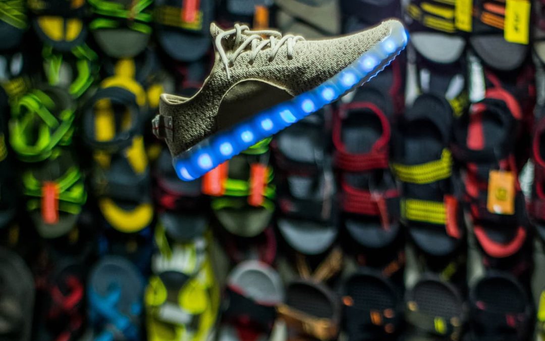 marketing: an image of flying running shoes with led lights